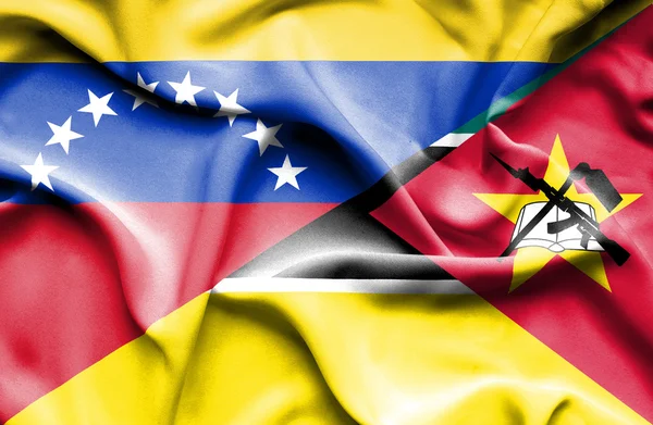 Flagge von Mosambik und Venezuela schwenken — Stockfoto