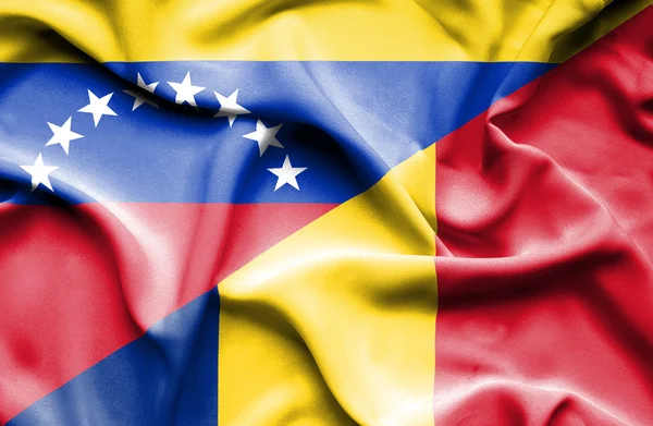 Waving flag of Romania and Venezuela — Stock Photo, Image