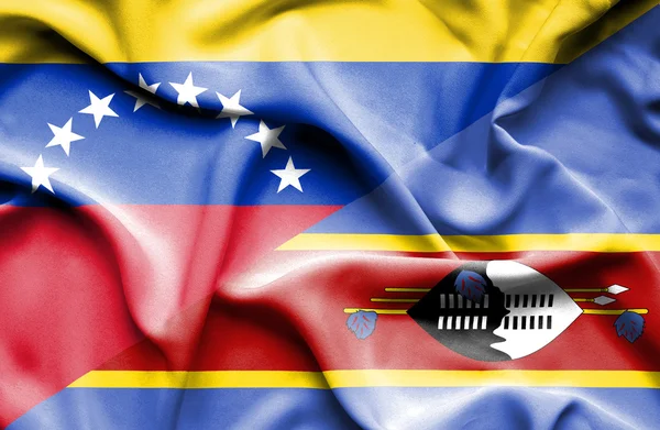 Waving flag of Swazliand and Venezuela — Stockfoto