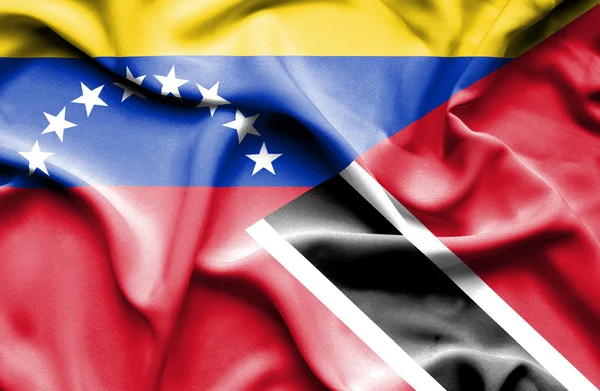 Waving flag of Trinidad and Tobago and Venezuela — Stock Photo, Image