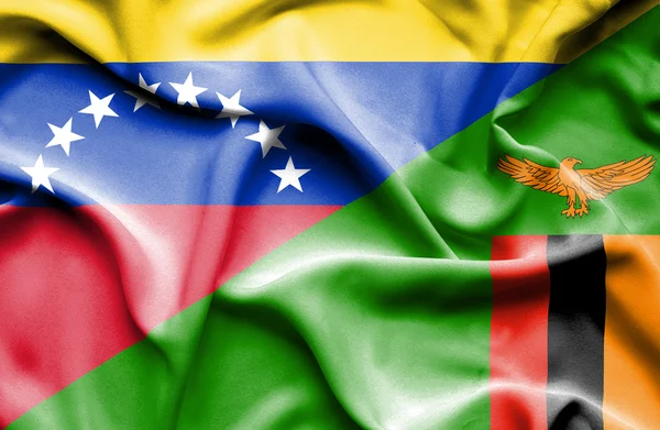 Waving flag of Zimbabwe and Venezuela — Stock Photo, Image