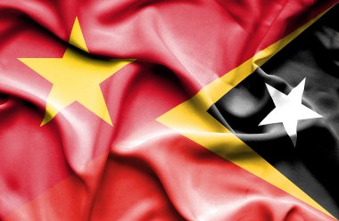 Waving flag of East Timor and Vietnam