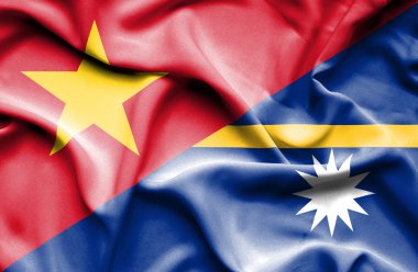 Waving flag of Nauru and Vietnam