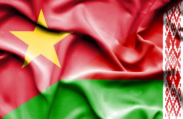 Waving flag of Belarus and Vietnam — ストック写真