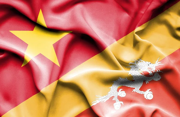Sventolando bandiera del Bhutan e del Vietnam — Foto Stock