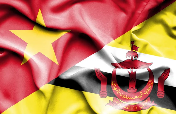 Waving flag of Brunei and Vietnam — Zdjęcie stockowe