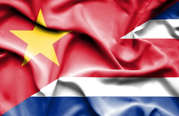 Bandeira acenando da Costa Rica e Vietnã — Fotografia de Stock