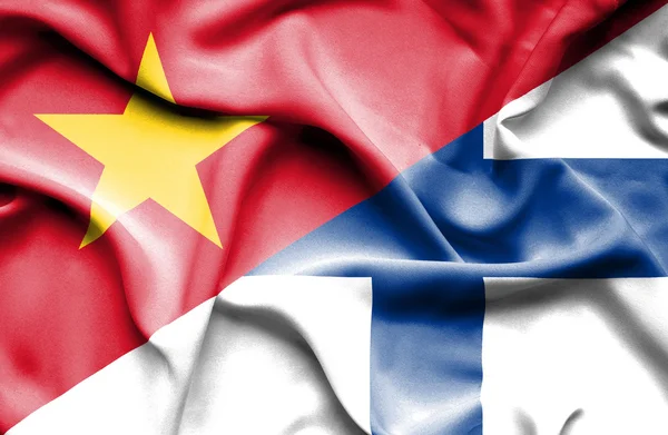 Waving flag of Finland and Vietnam — Stock Photo, Image