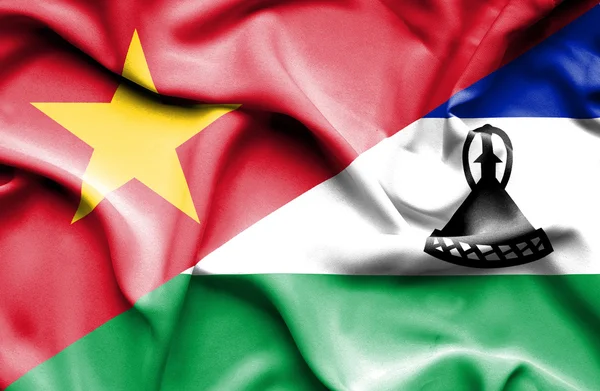 Drapeau agitant du Lesotho et du Vietnam — Photo