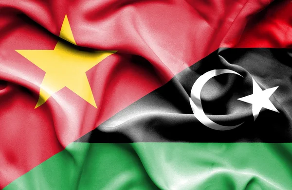 Vlající vlajka Libye a Vietnamu — Stock fotografie