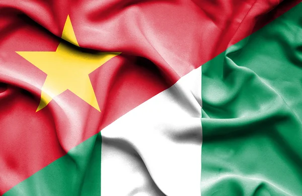 Waving flag of Nigeria and Vietnam — Zdjęcie stockowe