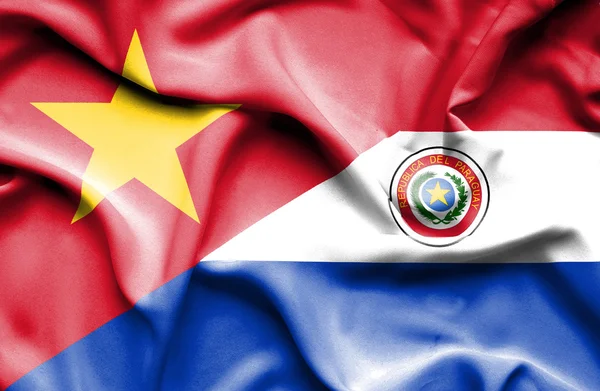 Drapeau agitant du Paraguay et du Vietnam — Photo