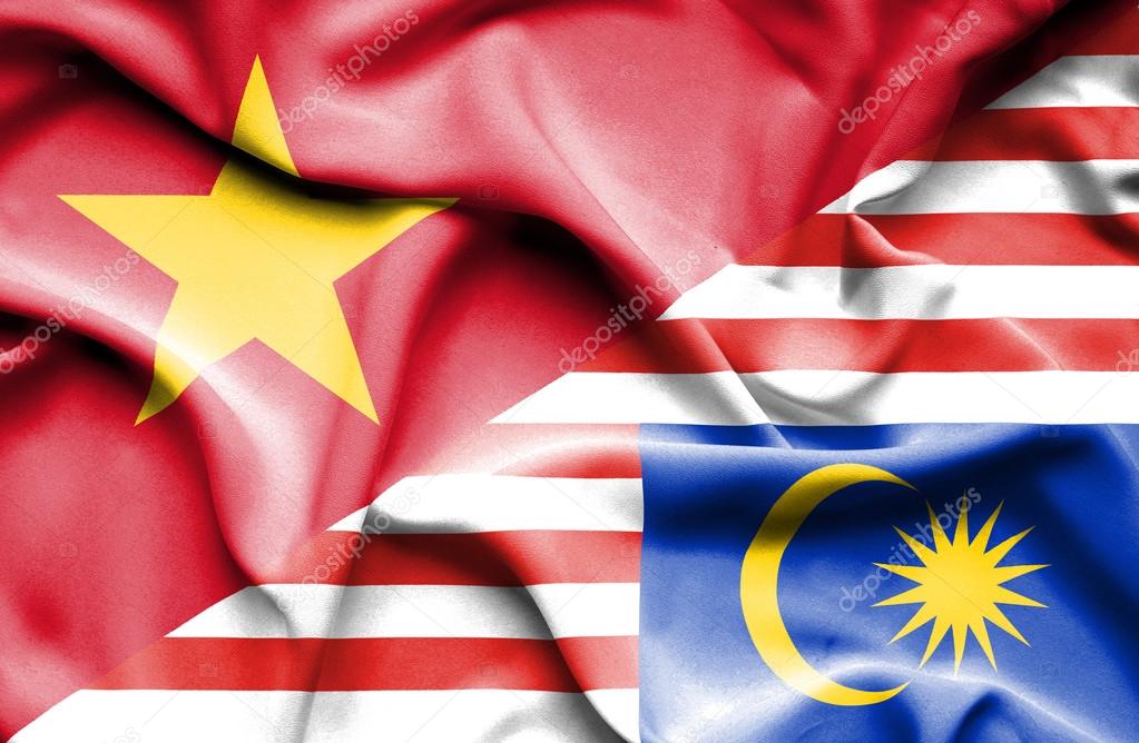 Waving flag of Malaysia and Vietnam