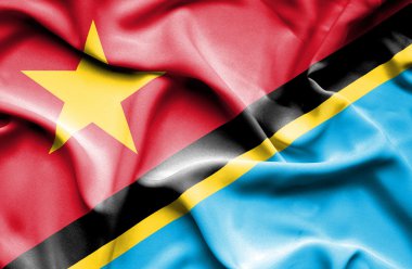 Waving flag of Tanzania and Vietnam