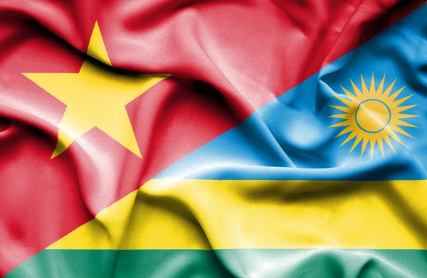 Waving flag of Rwanda and Vietnam — Φωτογραφία Αρχείου