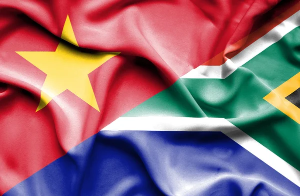 Ondeando la bandera de Sudáfrica y Vietnam —  Fotos de Stock