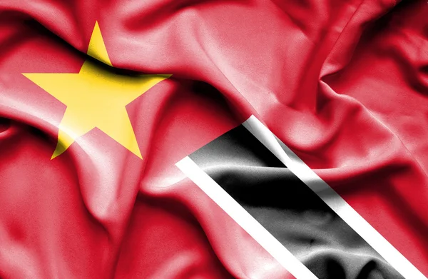 Waving flag of Trinidad and Tobago and Vietnam