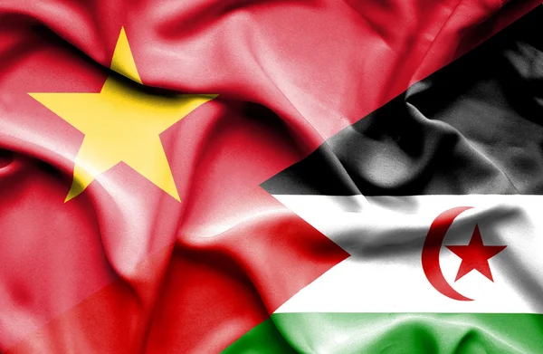 Waving flag of Western Sahara and Vietnam — Stockfoto