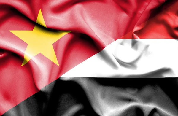 Waving flag of Yemen and Vietnam — Stok fotoğraf
