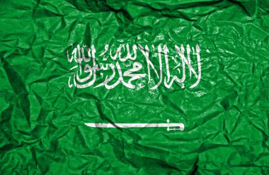 Suudi Arabistan vintage bayrağı eski buruşuk kağıt arka plan üzerinde