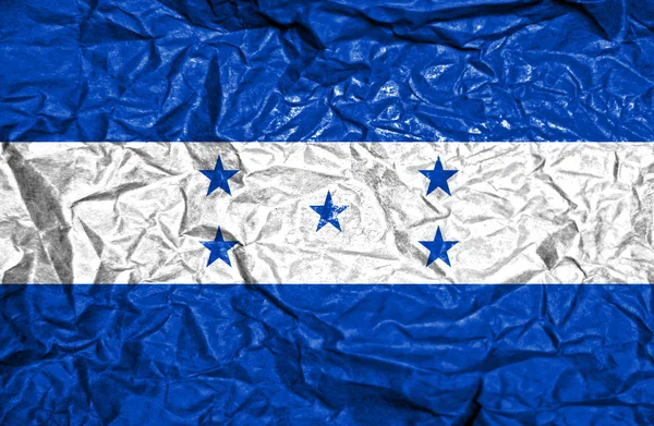 Bandera vintage Honduras sobre fondo de papel viejo arrugado —  Fotos de Stock