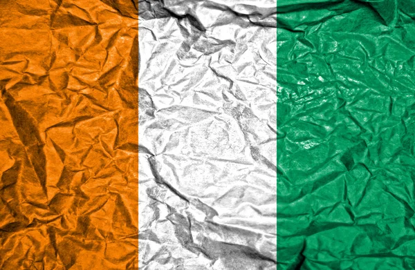 Ivory Coast vintage flag on old crumpled paper background — Stock Photo, Image