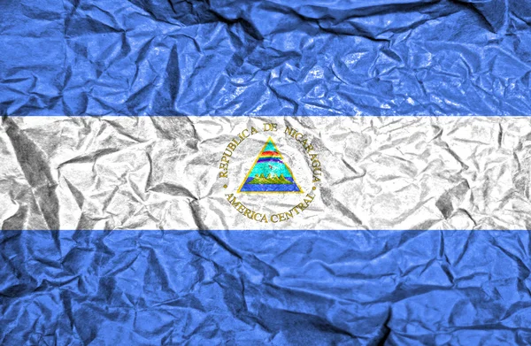 Nicaragua bandiera vintage su sfondo vecchio carta spiegazzata — Foto Stock