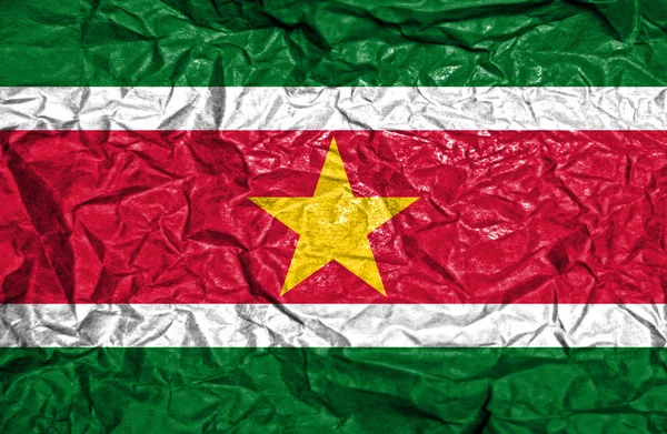 Suriname vintage flag on old crumpled paper background — Stock Photo, Image