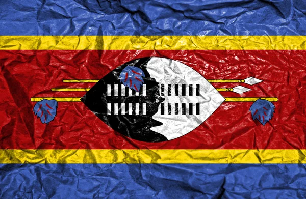 Swaziland vintage vlag op oude verfrommeld papier achtergrond — Stockfoto