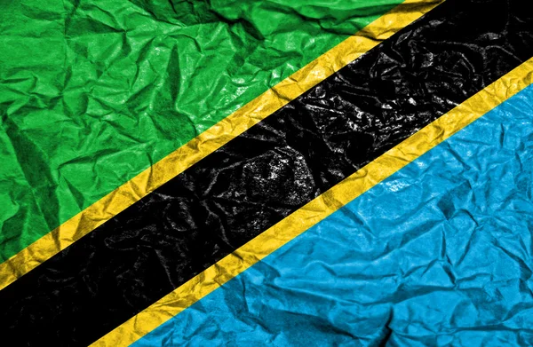 Tanzania vintage flagga på gamla skrynkligt papper bakgrund — Stockfoto