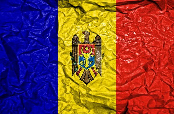 Moldávie vinobraní vlajka na starém červeném pozadí — Stock fotografie