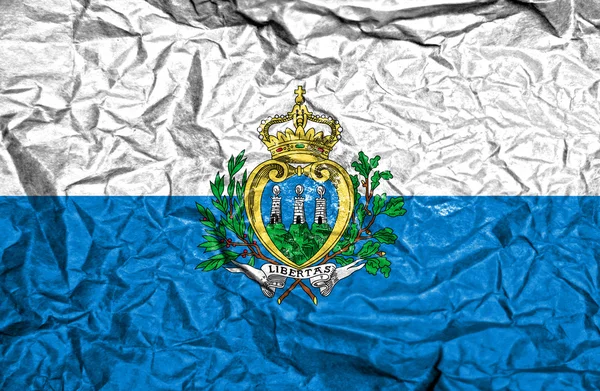 San Marino bandiera vintage su sfondo vecchio carta spiegazzata — Foto Stock