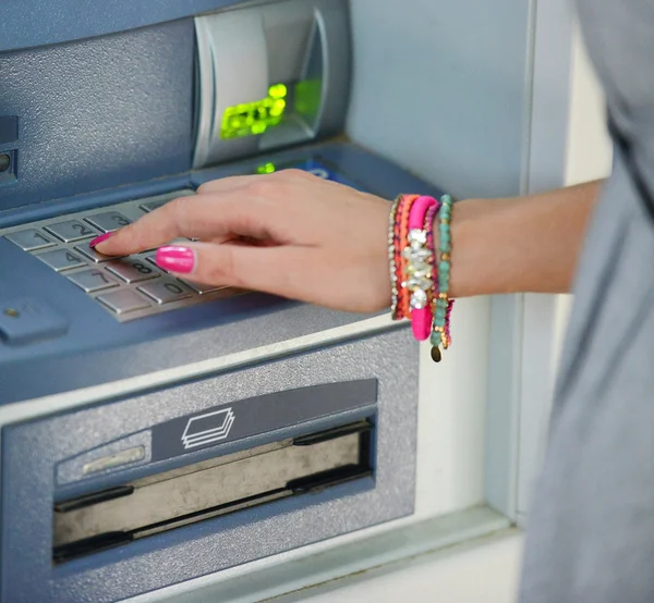 Close-up of hand entering PIN/pass code on ATM/bank machine keyp — Stock Photo, Image