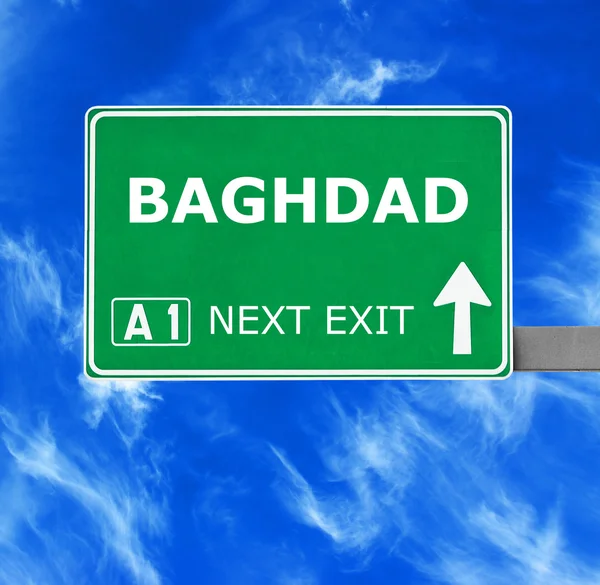BAGHDAD road sign against clear blue sky — Stock Photo, Image