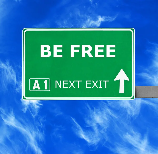 BE FREE road sign against clear blue sky — Stock Photo, Image