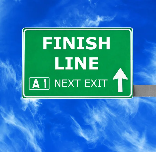FINISH LINE road sign against clear blue sky — Stock Photo, Image