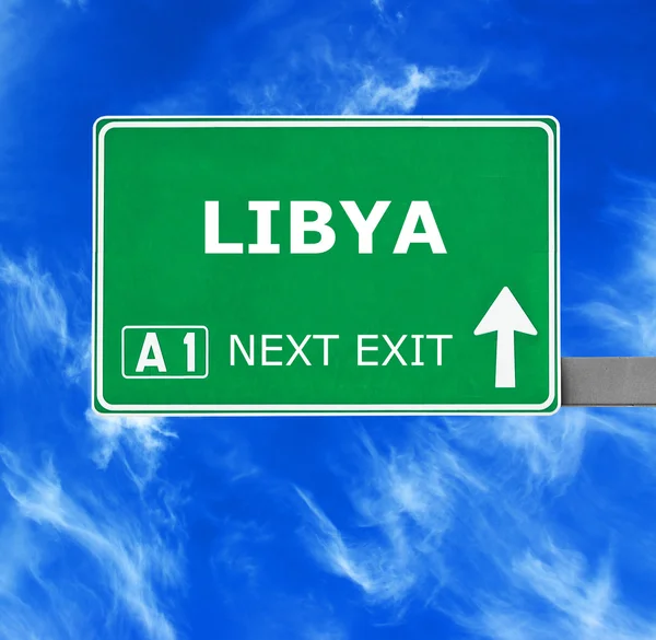 LIBYA road sign against clear blue sky — Stock Photo, Image