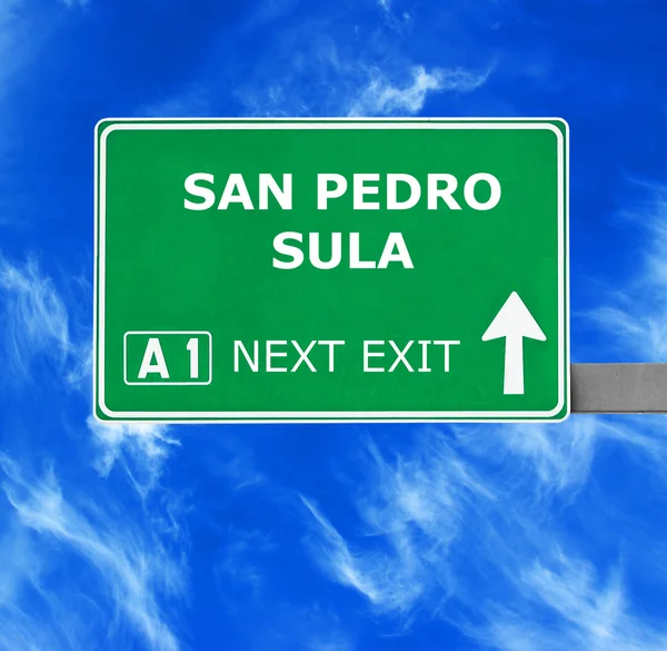 SAN PEDRO SULA road sign against clear blue sky — Stock Photo, Image