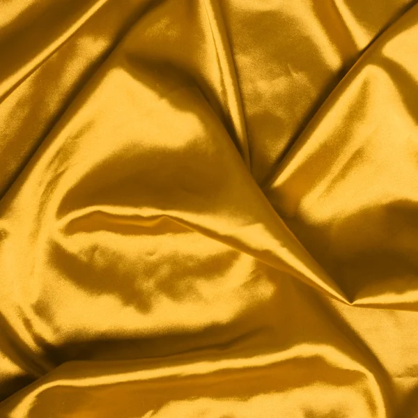 Glatte elegante Gold Seide Hintergrund — Stockfoto