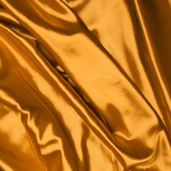 Fond lisse élégant en soie dorée — Photo