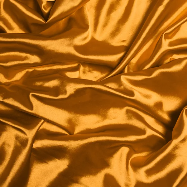 Glatte elegante Gold Seide Hintergrund — Stockfoto