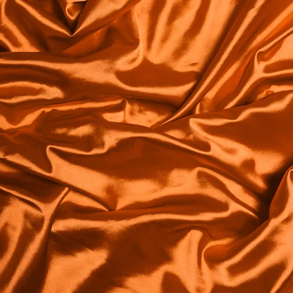 滑らかなエレガントなオレンジ色のシルク背景 — ストック写真