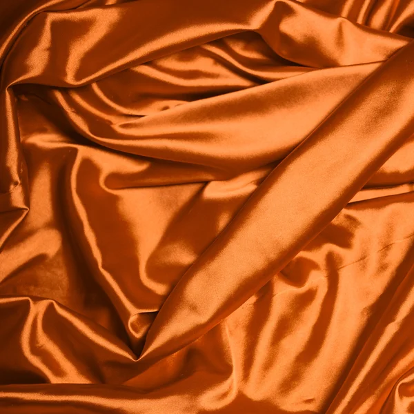 Glatte elegante orange Seide Hintergrund — Stockfoto