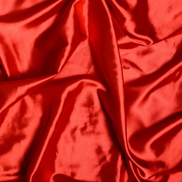 Soepele elegante rode zijde achtergrond — Stockfoto