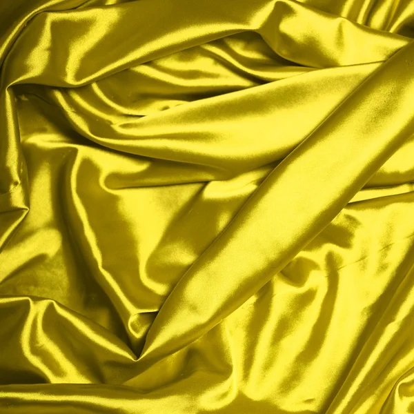 Smooth elegant yellow silk background — Stock Photo, Image