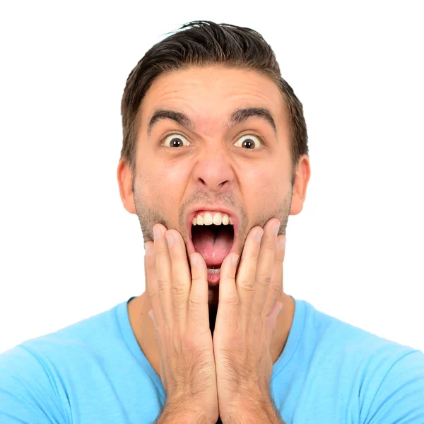 Portrait of angry man screaming and pulling hair against white b — Stock Photo, Image