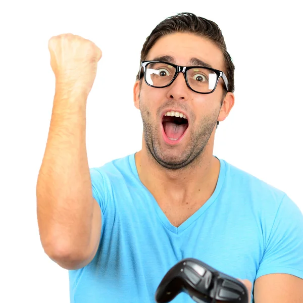 Portrait of handsome man holding joystick for video games agains — Stock Photo, Image