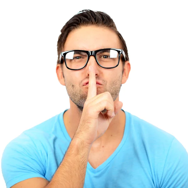 Portrait of man with gesture for silence against white backgroun — Stock Photo, Image