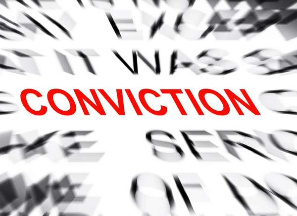 Блакитний текст з фокусом на CONVICTION — стокове фото