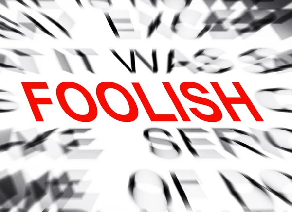 Blured text with focus on FOOLISH — Stock Photo, Image